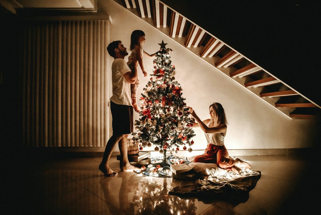 Family around the Christmas tree