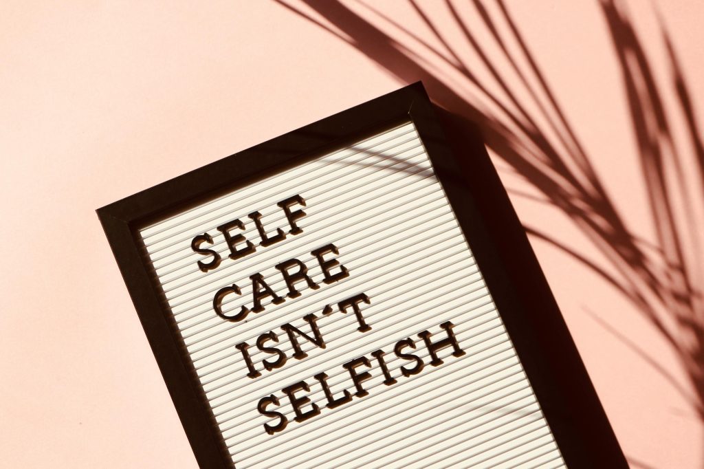 Sign saying, 'self-care isn't selfish.'